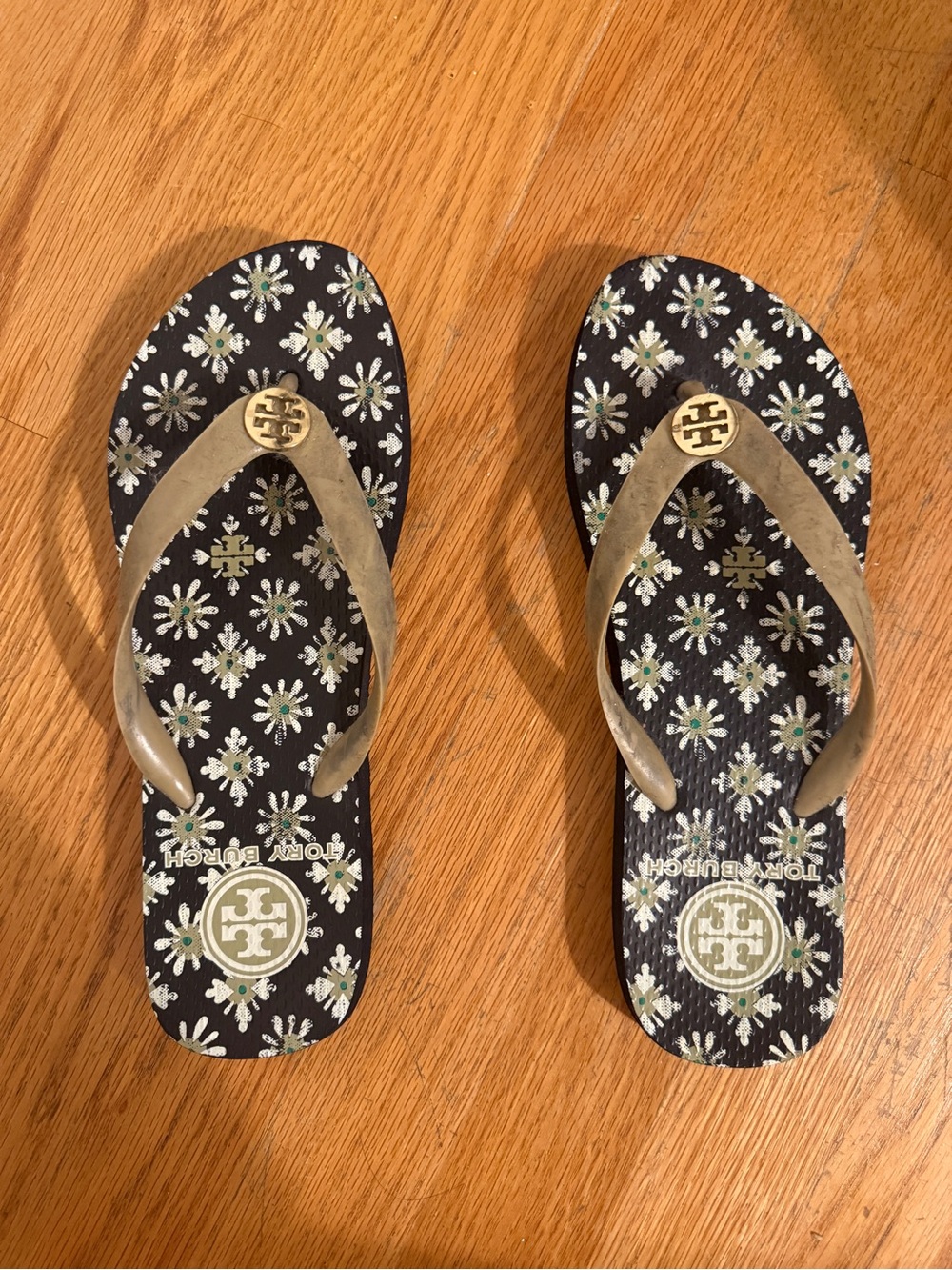 Tory Burch Black Floral Flip Flops with Gold Straps